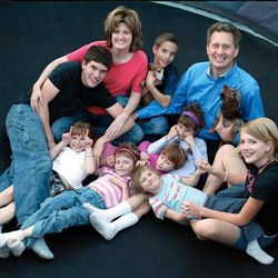 The Luke family in 2006, one year after adopting their five girls.