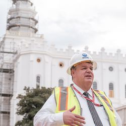 Brent Roberts, managing director of the Special Projects Department for The Church of Jesus Christ of Latter-day Saints, talks to members of the media outside the St. George Utah Temple on Friday, Nov. 6, 2020, in St. George. The historic temple is undergoing renovations that are expected to be completed in 2022.