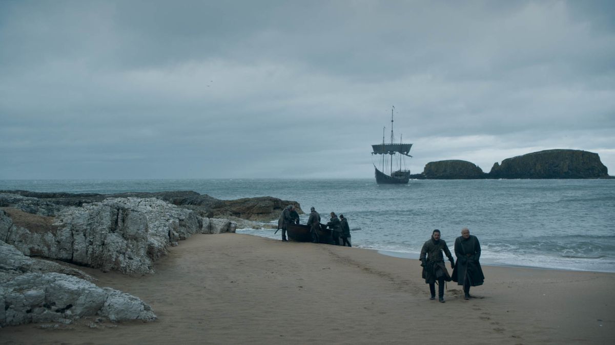 varys and jon snow on dragonstone beach - game of thrones season 8 episode 5