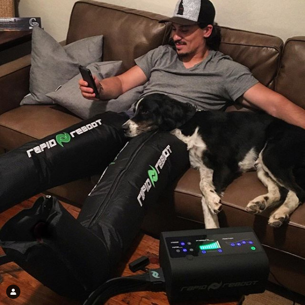 Tony Wolters and his dog, Levi, resting and recuperating