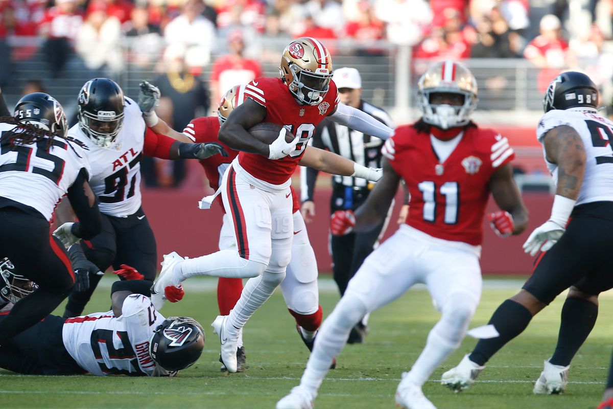 Deebo Samuel #19 of the San Francisco 49ers runs after making a catch during the game against the Atlanta Falcons at Levi’s Stadium on December 19, 2021 in Santa Clara, California. The 49ers defeated the Falcons 31-13.