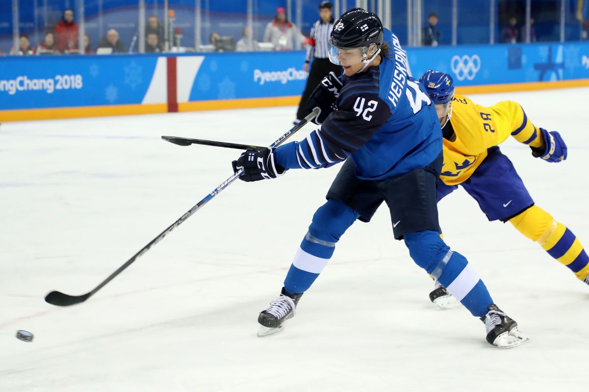 Olympics: Ice Hockey-Men Team Group C - SWE-FIN