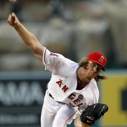 Los Angeles Angels starting pitcher Jered Weaver throws to a Chicago Cubs batter in the first inning during an interleague baseball game Tuesday, June 4, 2013, in Anaheim, Calif.  