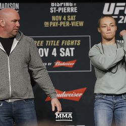 Rose Namajunas gestures to the crowd at UFC 217 press conference.