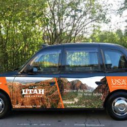 A London taxi is emblazoned with a Utah landscape as part of a summer marketing campaign to attract tourists.