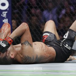 Tony Ferguson reacts to the fight being called, Anthony Pettis’ corner has ended the bout.