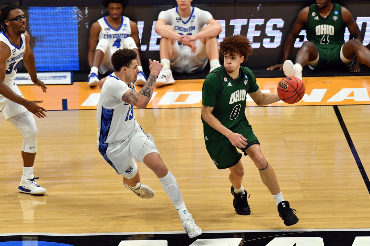 Ohio Bobcats guard Jason Preston (0) drives against Creighton Bluejays forward Christian Bishop (13) in the first half in the second round of the 2021 NCAA Tournament at Hinkle Fieldhouse.&nbsp;