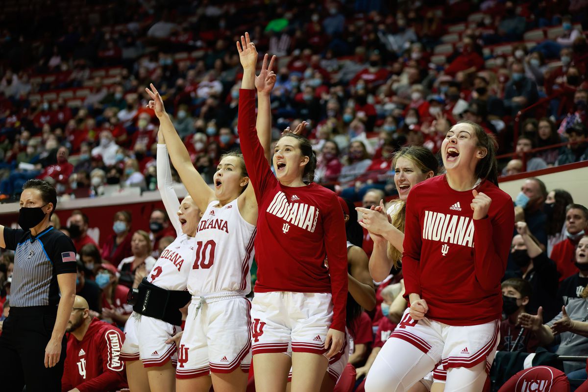 Indiana Hoosiers Mackenzie Holmes (right) celebrates after...