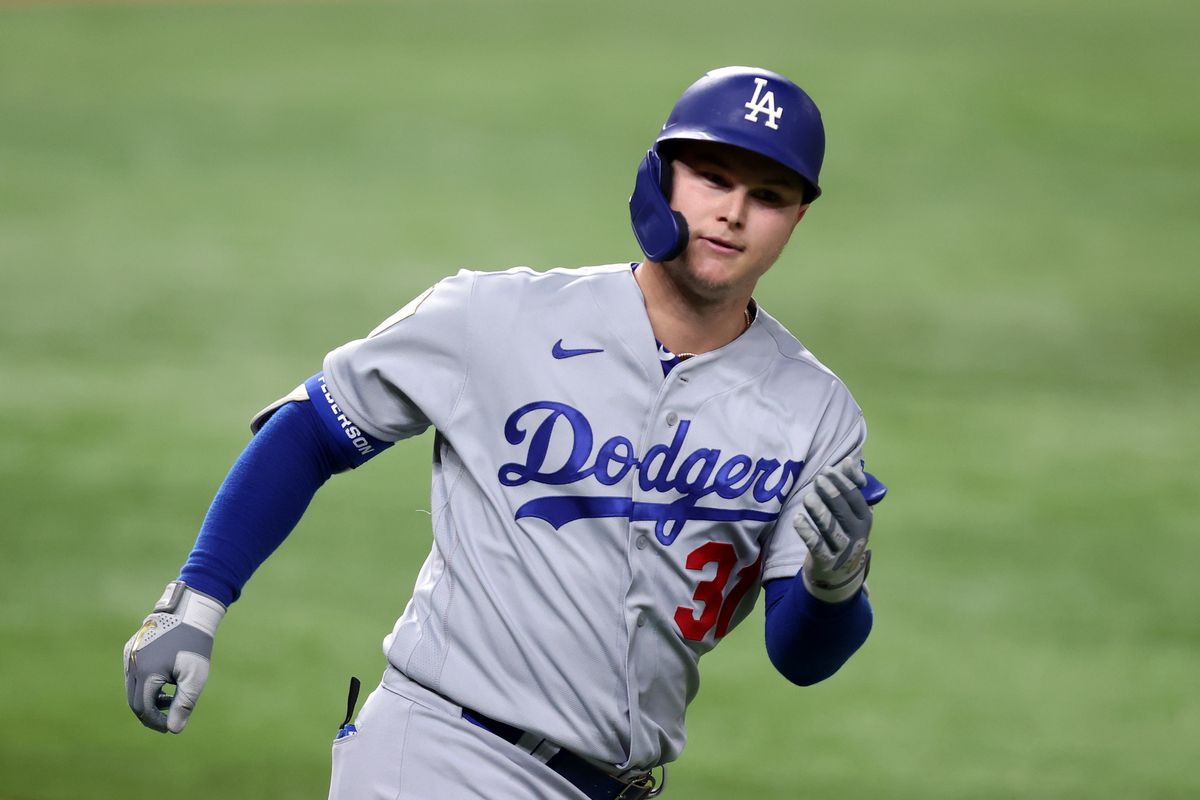 Joc Pederson #31 of the Los Angeles Dodgers rounds the bases after hitting a solo home run against the Tampa Bay Rays during the second inning in Game Five of the 2020 MLB World Series at Globe Life Field on October 25, 2020 in Arlington, Texas.