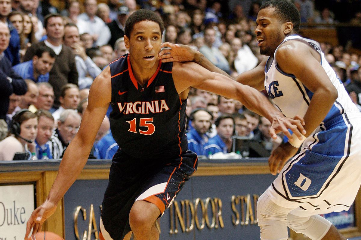 A younger Malcolm Brogdon attempts to evade Duke's defensive strategy of tickling him every time he gets the ball.
