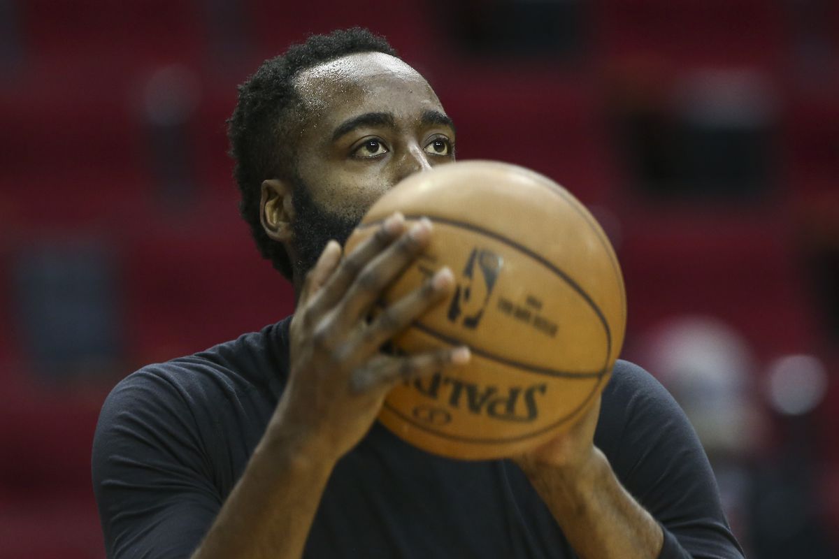 Houston Rockets guard James Harden warms up before a game against the New Orleans Pelicans at Toyota Center.