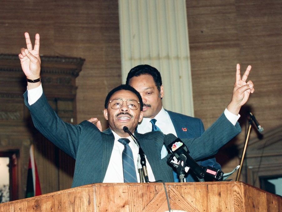 Roland Burris and the Rev Jesse Jackson in 1995. Sun-Times File Photo.