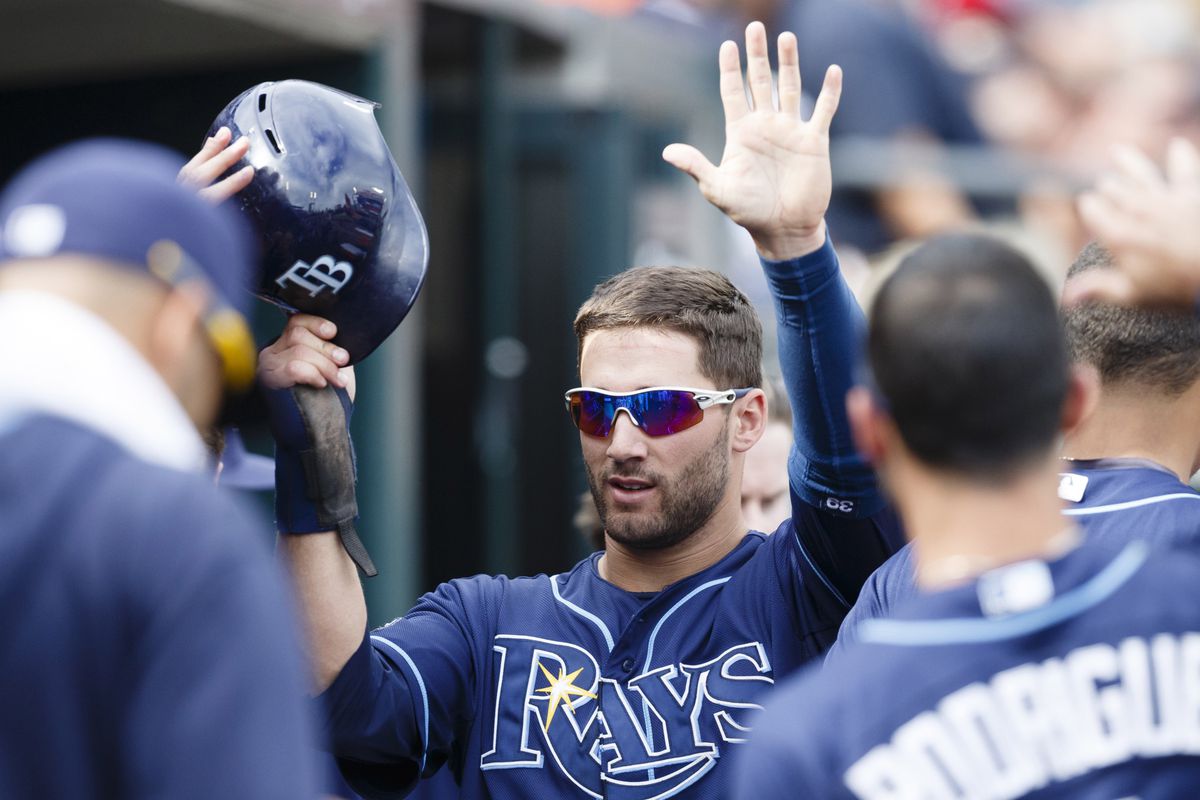 Lady killer and ball crusher, Kevin Kiermaier, high fives some peasants.