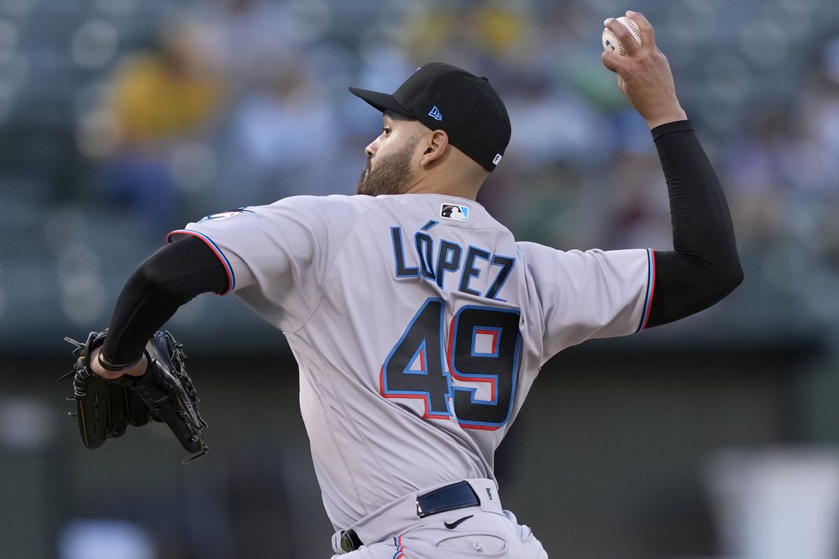 Pablo Lopez #49 of the Miami Marlins pitches against the Oakland Athletics in the bottom of the first inning at RingCentral Coliseum on August 23, 2022 in Oakland, California.