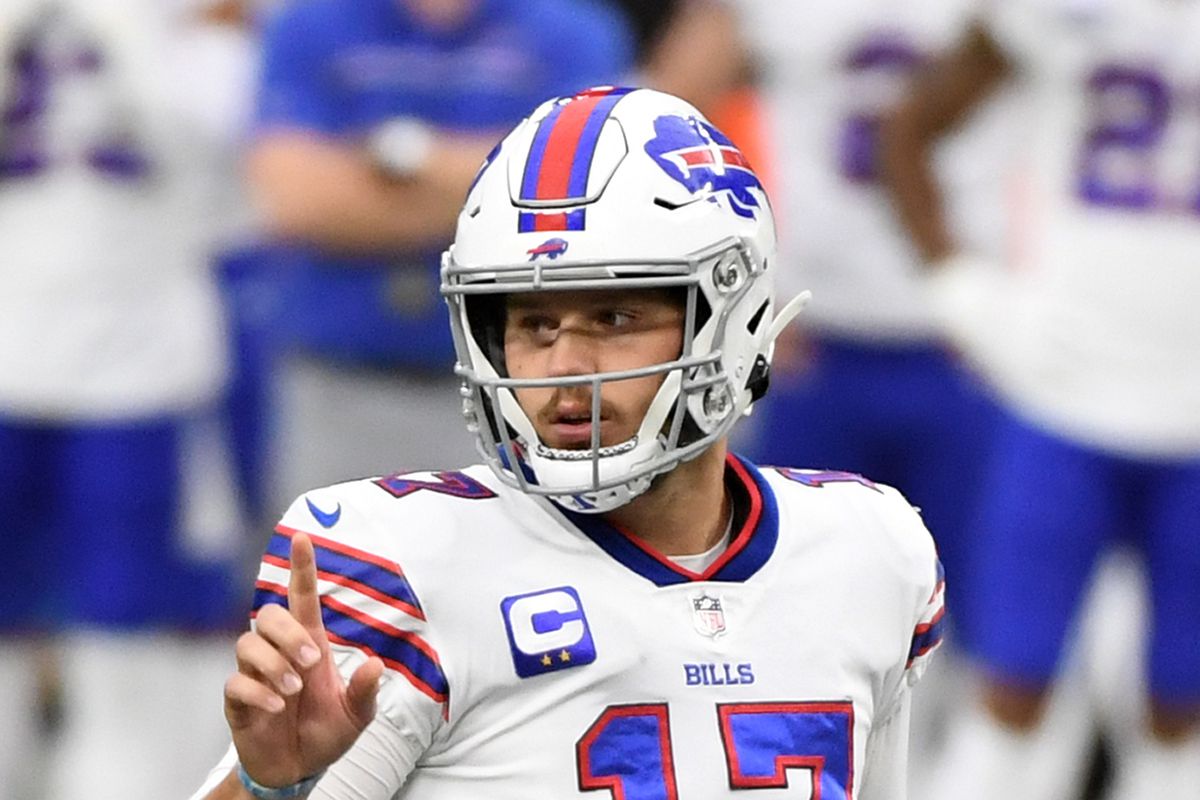 Quarterback Josh Allen of the Buffalo Bills calls a play against the Las Vegas Raiders at the line of scrimmage during the first half of the NFL game at Allegiant Stadium on October 4, 2020 in Las Vegas, Nevada. The Bills defeated the Raiders 30-23.