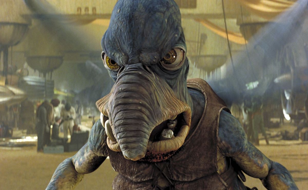 Trunk-nosed, blue-skinned, flying alien Watto seen in closeup in The Phantom Menace
