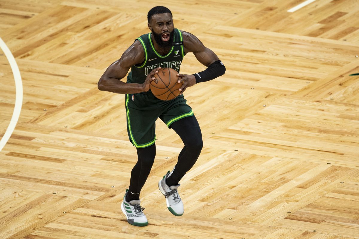Jaylen Brown of the Boston Celtics reacts as he looks to pass during the second half against the Portland Trail Blazers at TD Garden on May 02, 2021 in Boston, Massachusetts.
