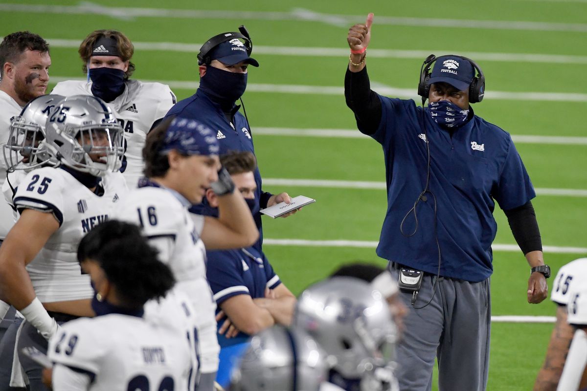 Defensive line coach Jackie Shipp (R) of the Nevada Wolf Pack gestures on the sideline in the first half of the team’s game against the UNLV Rebels at Allegiant Stadium on October 31, 2020 in Las Vegas, Nevada.&nbsp;