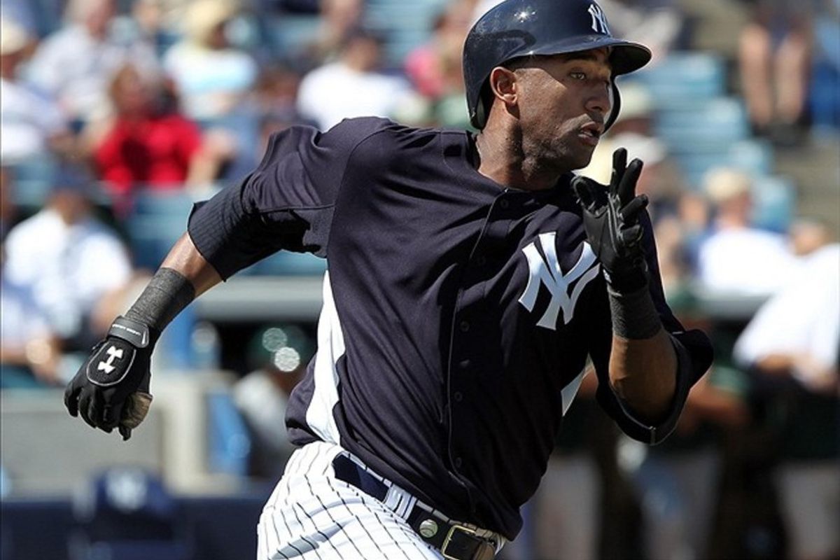 March 2, 2012; Tampa, FL, USA; New York Yankees shortstop Eduardo Nunez (26) hits a triple in the second inning during spring training against the South Florida Bulls at George M. Steinbrenner Field. Mandatory Credit: Kim Klement-US PRESSWIRE