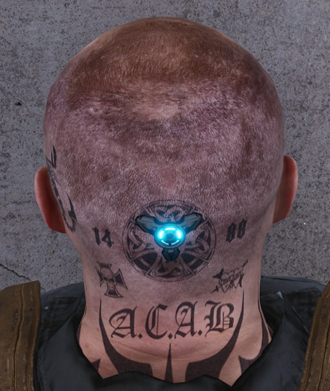 Scum - close-up of Nazi imagery in tattoo