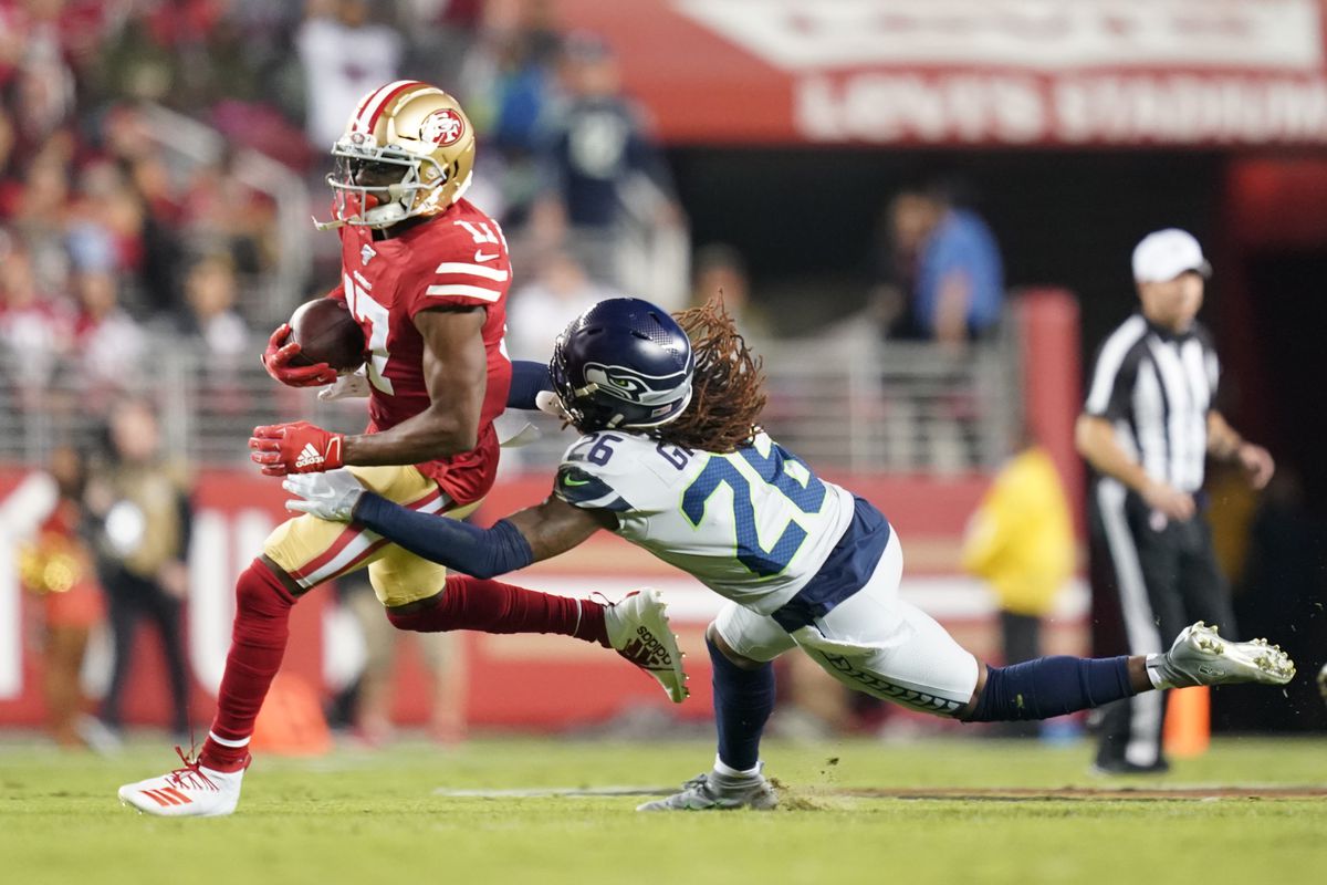 San Francisco 49ers wide receiver Emmanuel Sanders is tackled by Seattle Seahawks cornerback Shaquill Griffin during the first quarter at Levi’s Stadium.