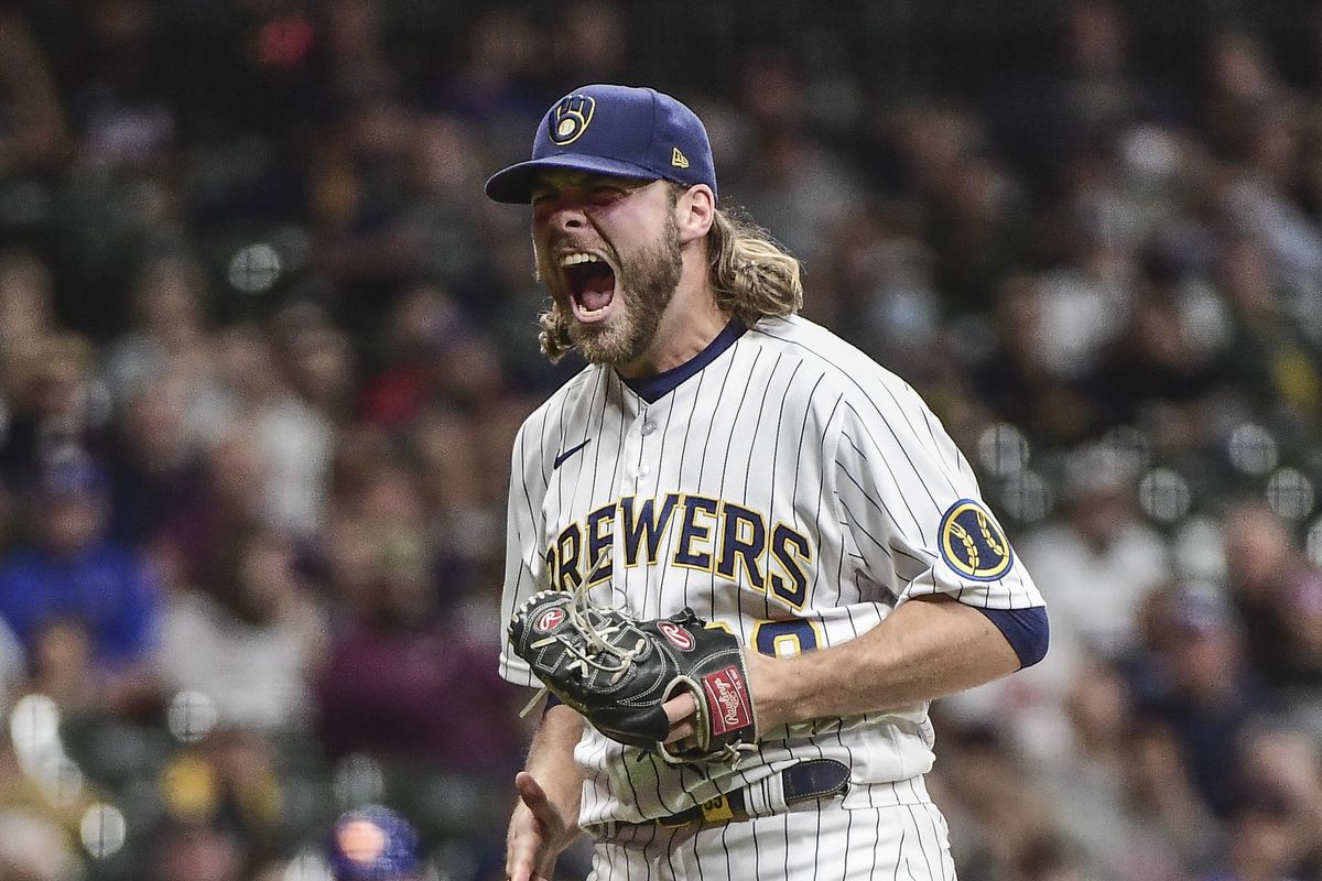 Milwaukee Brewers pitcher Corbin Burnes (39) reacts after retiring the side in the seventh inning during the game against the New York Mets at American Family Field.