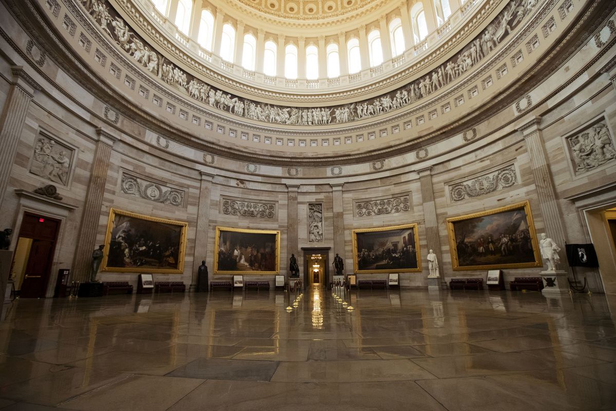 The empty U.S. Capitol Rotunda is seen during a partial government shutdown in Washington, Monday, Dec. 24, 2018. Both sides in the long-running fight over funding President Donald Trump's U.S.-Mexico border wall appear to have moved toward each other, bu
