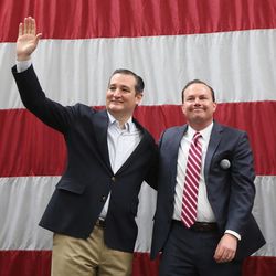 GOP presidential candidate and Texas Sen. Ted Cruz, left, and Sen. Mike Lee, R-Utah, acknowledge the crowd at a rally in Draper at the American Preparatory Academy Saturday, March 19, 2016.