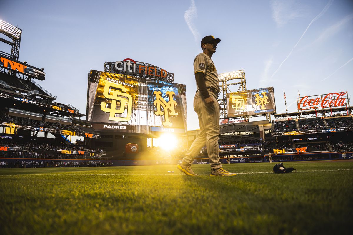 Matt Carpenter of the San Diego Padres warms up in the outfield before the game against the New York Mets at Citi Field on April 10, 2023 in New York City.