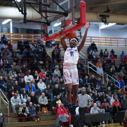 Bloom’s Keshawn Williams (11) gets a steal and a dunk against Homewood-Flossmoor, Tuesday  03-05-19. Worsom Robinson/For the Sun-Times.