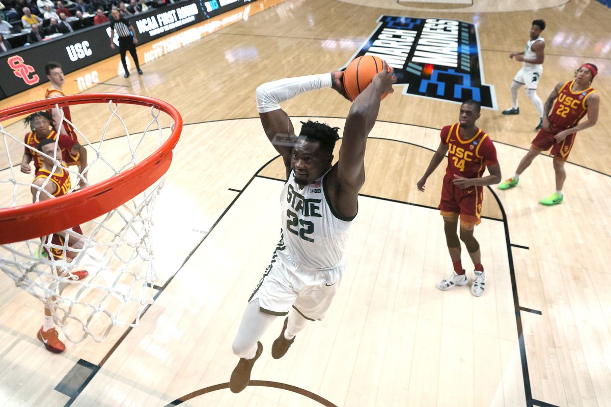 Mady Sissoko #22 of the Michigan State Spartans dunks the ball against the USC Trojans during the first half in the first round game of the NCAA Men’s Basketball Tournament at Nationwide Arena on March 17, 2023 in Columbus, Ohio.