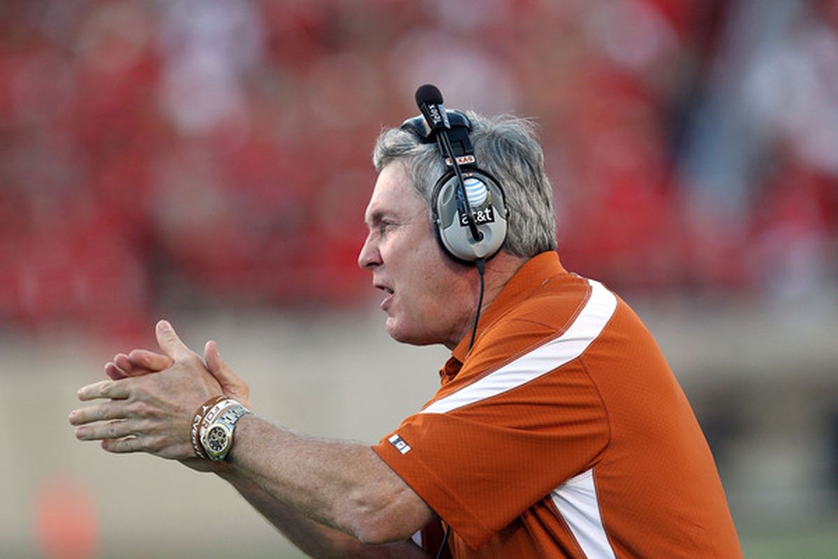 LUBBOCK TX - SEPTEMBER 18:  Head coach Mack Brown of the Texas Longhorns reacts on the sidelines against the Texas Tech Red Raiders at Jones AT&T Stadium on September 18 2010 in Lubbock Texas.  (Photo by Ronald Martinez/Getty Images)