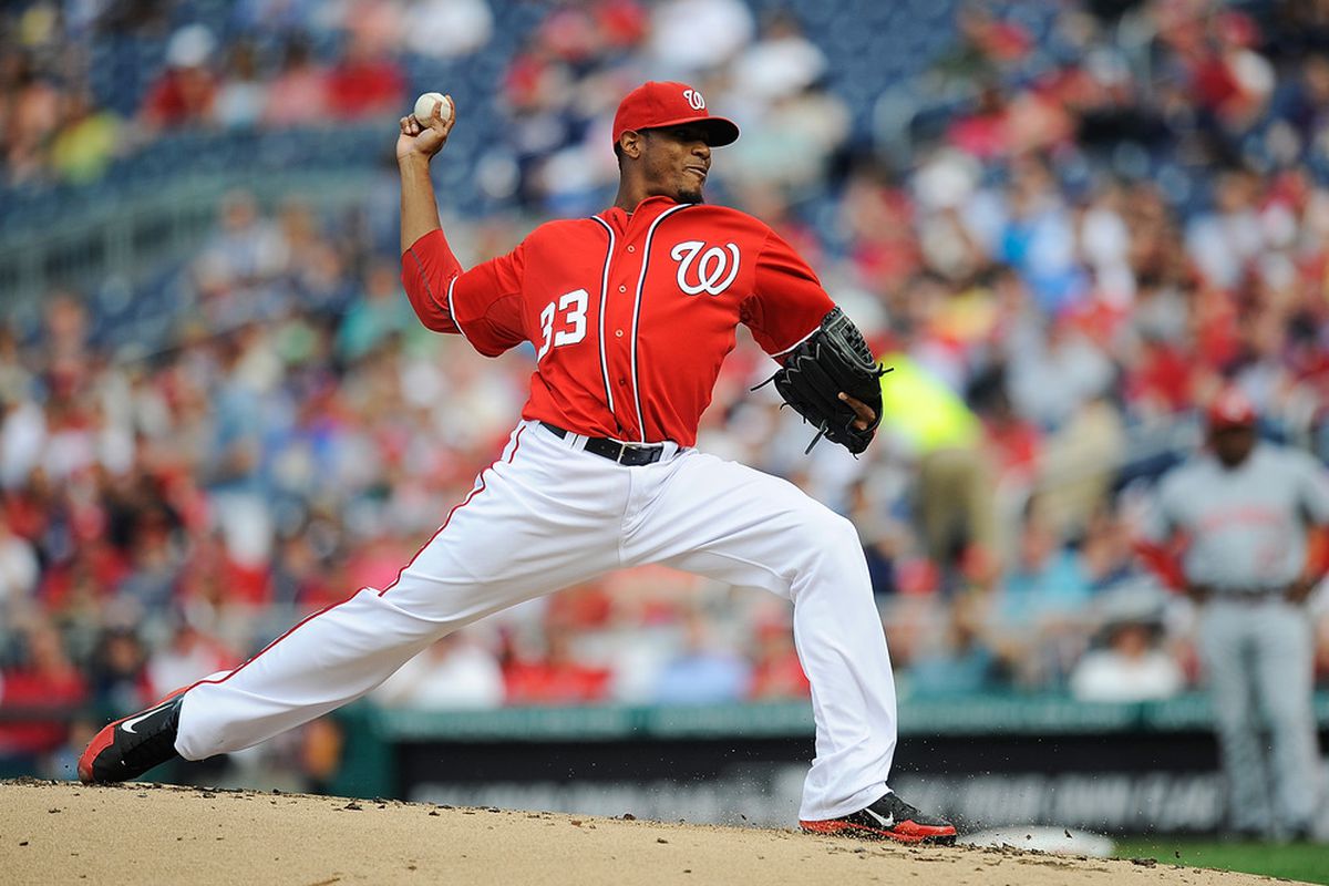 WASHINGTON, DC - APRIL 14:  Edwin Jackson #33 of the Washington Nationals throws a pitch against the Cincinnati Reds at Nationals Park on April 14, 2012 in Washington, DC.  (Photo by Patrick McDermott/Getty Images)