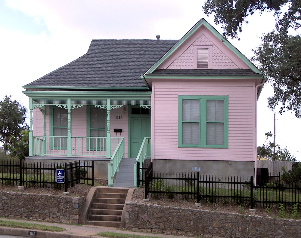 Small pink Victorian-era house