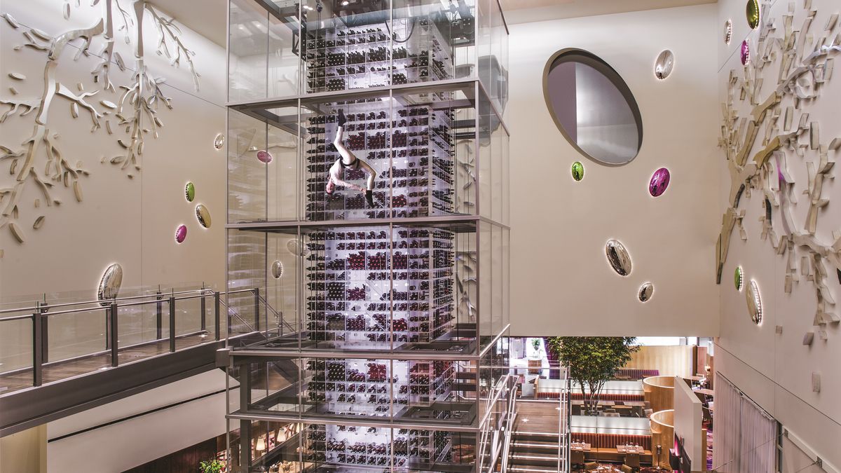 A wine tower in a restaurant