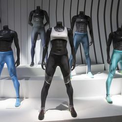 The Nike Power Speed tights, center, are displayed during a news conference, Wednesday, March 16, 2016, in New York. 
