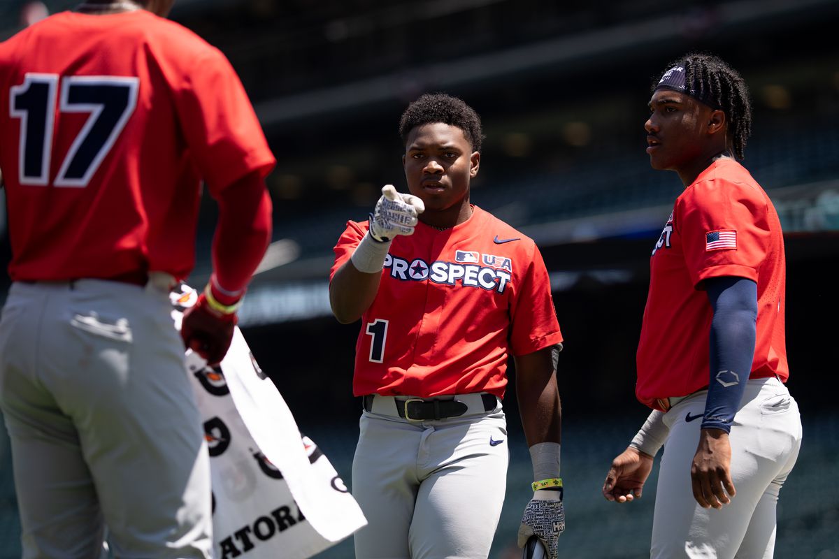 Termarr Johnson points to a fellow contestant during a break in the action in the Major League Baseball All-Star High School Home Run Derby at Coors Field