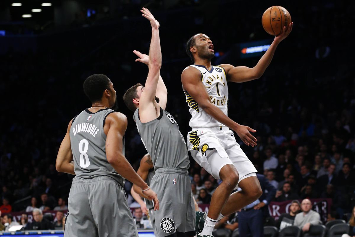 Indiana Pacers forward T.J. Warren drives to the basket against Brooklyn Nets defenders during the first half at Barclays Center.&nbsp;