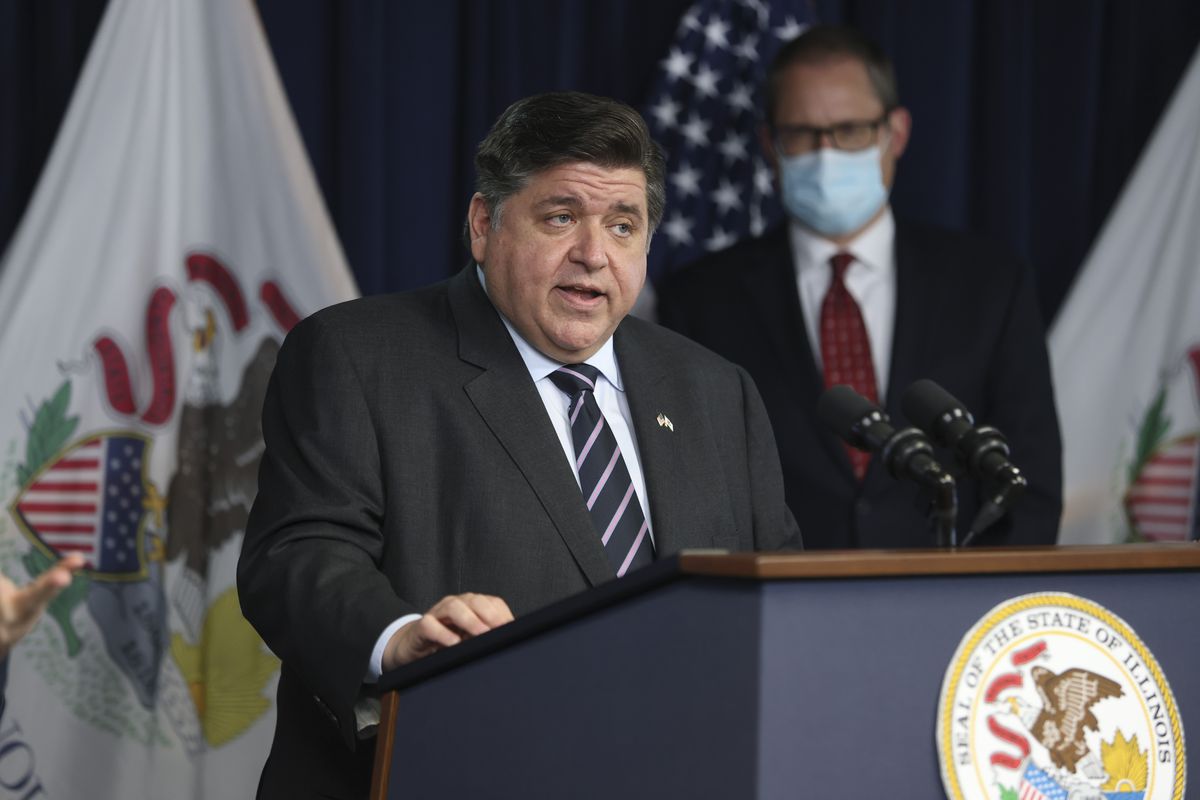 Gov. J.B. Pritzker speaks about the increase in COVID-19 cases during a press conference at the Thompson Center on Monday.