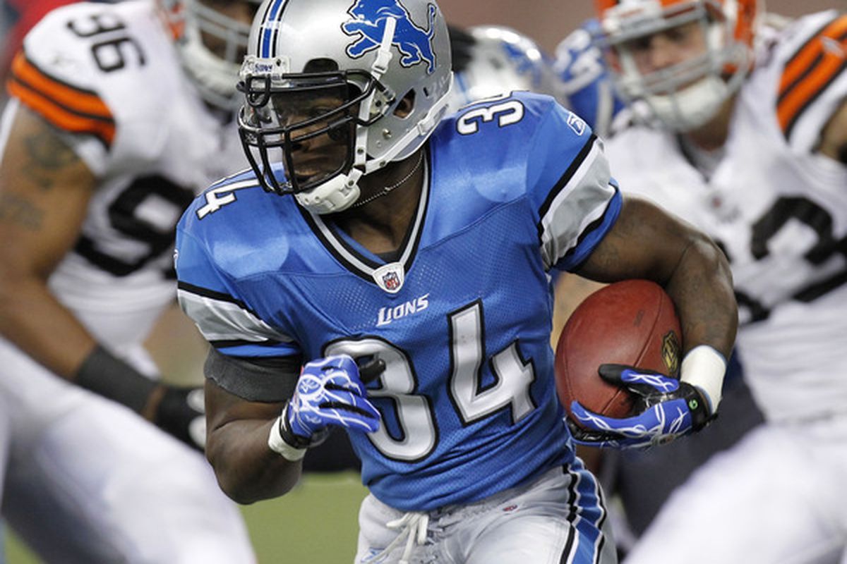 DETROIT - AUGUST 28: Kevin Smith #34 of the Detroit Lions looks for running room while playing the Cleveland Browns during a preseason game on August 28 2010 at Ford Field in Detroit Michigan. (Photo by Gregory Shamus/Getty Images)