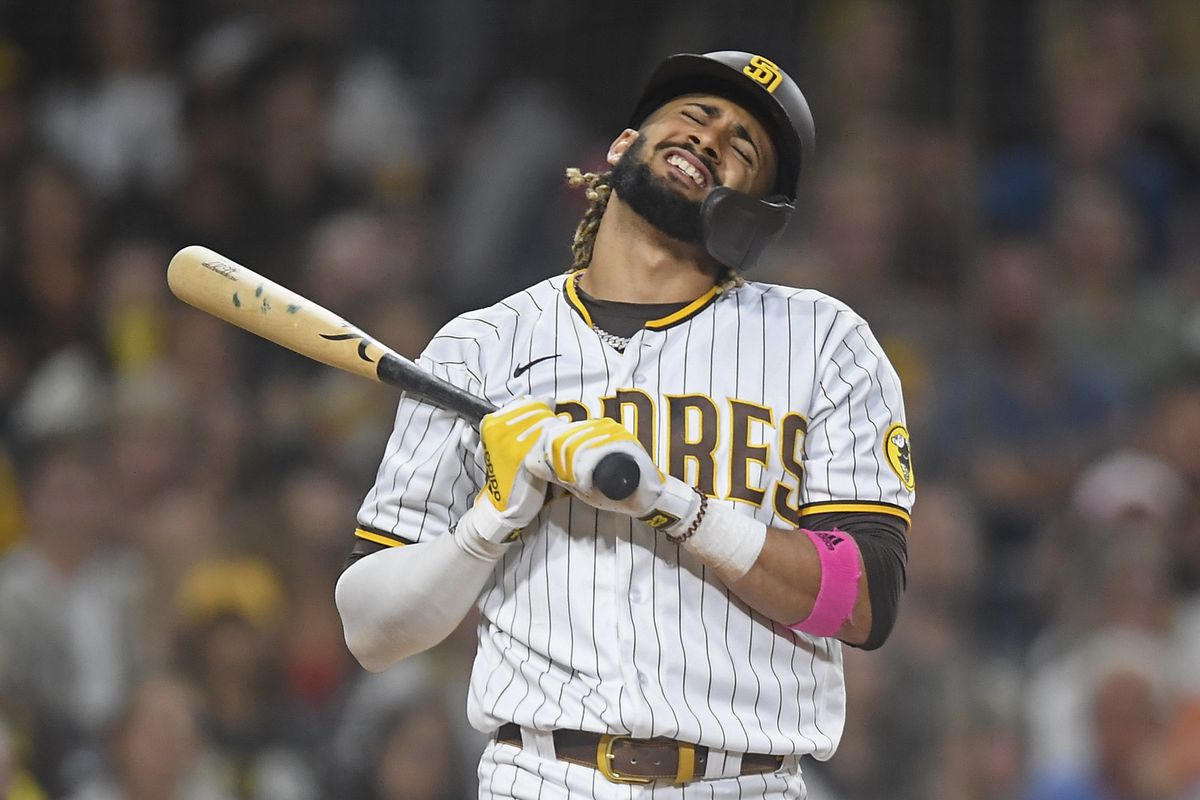 Fernando Tatis Jr. of the San Diego Padres reacts after striking out during the ninth inning of a baseball game against the San Francisco Giants at Petco Park on September 21, 2021 in San Diego, California.