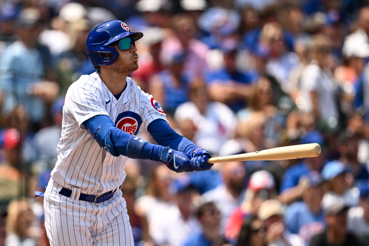 Cody Bellinger of the Chicago Cubs hits a two-run home run in the first inning of the game against the St. Louis Cardinals at Wrigley Field on July 23, 2023 in Chicago, Illinois.