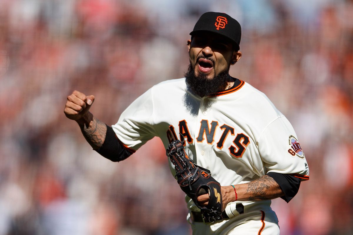 Sergio Romo punching the air in celebration