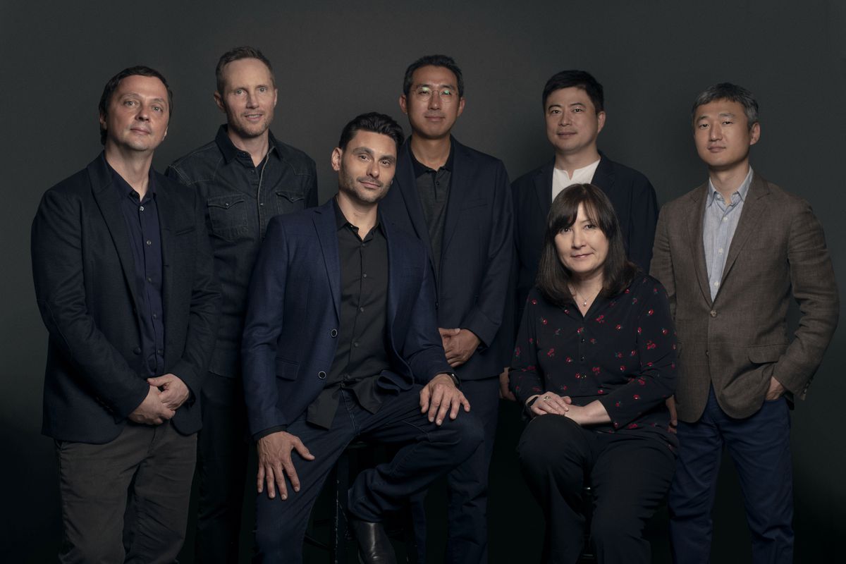 A photo of the That’s No Moon leadership team and Smilegate executives