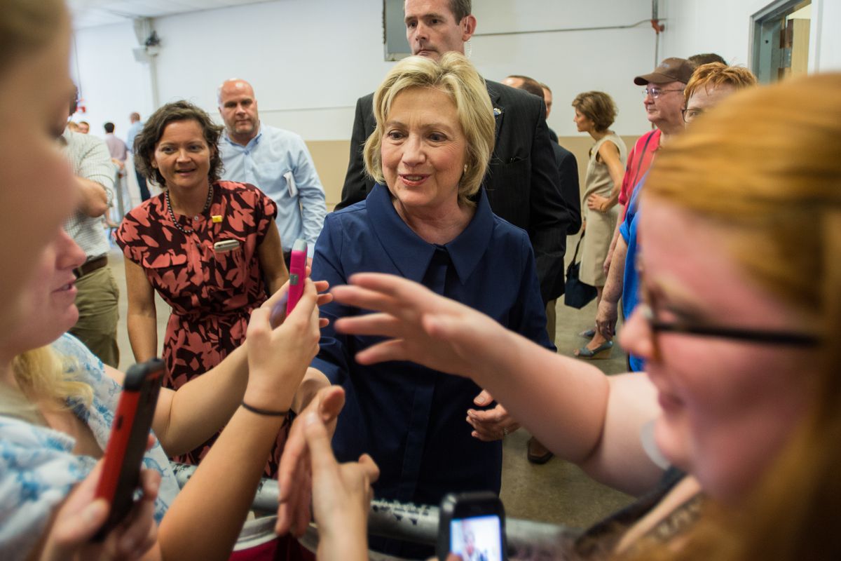 Democratic Presidential hopeful Hillary Clinton takes time to meet supporters and take photos at the Annual Hawkeye Labor Council AFL-CIO Labor Day picnic on September 7, 2015, at Hawkeye Downs in Cedar Rapids, Iowa.