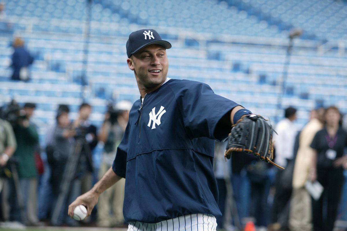 New York Yankees’ shortstop Derek Jeter takes some warm-up t