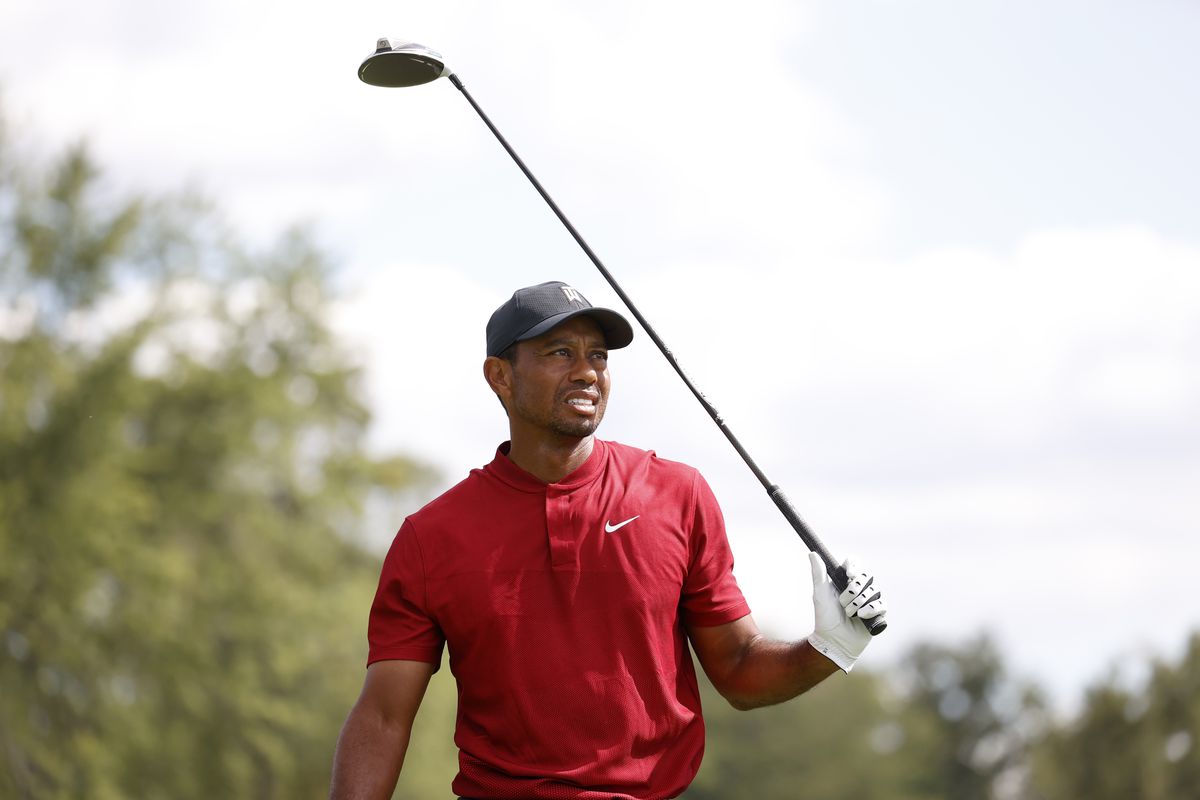 Tiger Woods hits his tee shot on the 9th hole during the final round of the BMW Championship golf tournament at Olympia Fields Country Club - North.