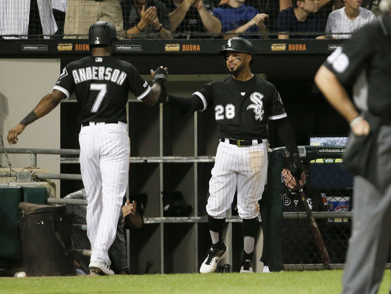 Tim Anderson #7 of the Chicago White Sox is congratulated by Leury Garcia #28 after he scored during the fifth inning against the Cleveland Indians at Guaranteed Rate Field on May 31, 2019 in Chicago, Illinois.    