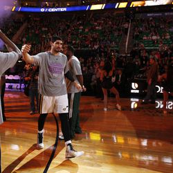 Players enter before the Utah Jazz take on the Memphis Grizzlies in Salt Lake City Wednesday, Feb. 4, 2015.