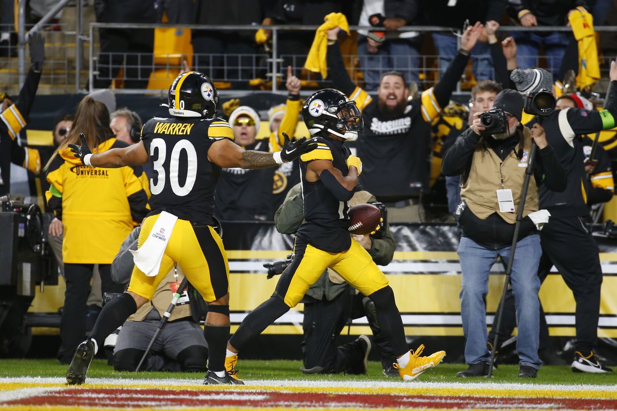 Calvin Austin III #19 of the Pittsburgh Steelers celebrates after scoring a touchdown during the second quarter of a game against the Cincinnati Bengals at Acrisure Stadium on December 23, 2023 in Pittsburgh, Pennsylvania.